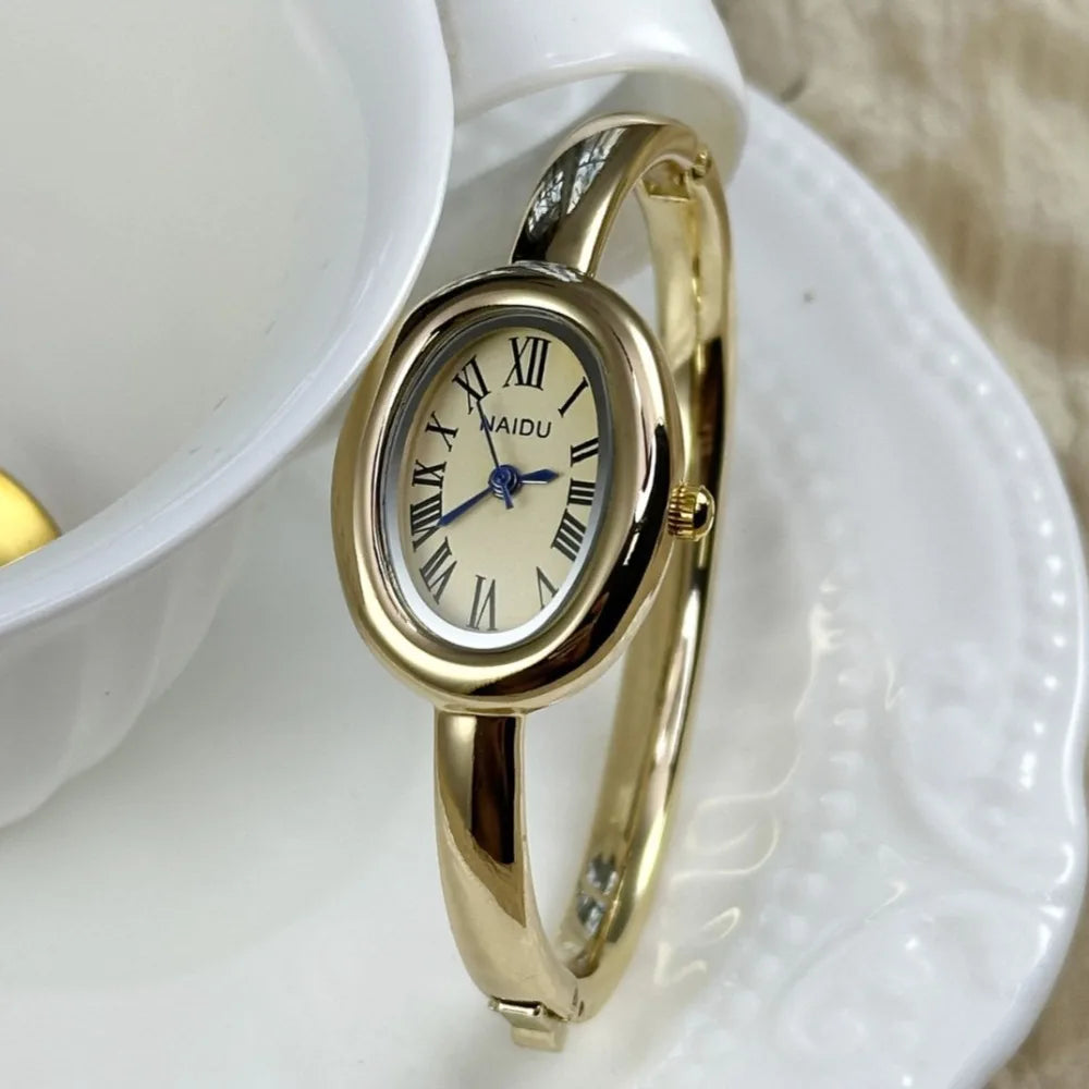 Gold Bangle Bracelet Watch for Women – Oval Dial, Roman Numerals