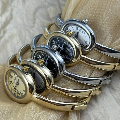 Gold Bangle Bracelet Watch for Women – Oval Dial, Roman Numerals
