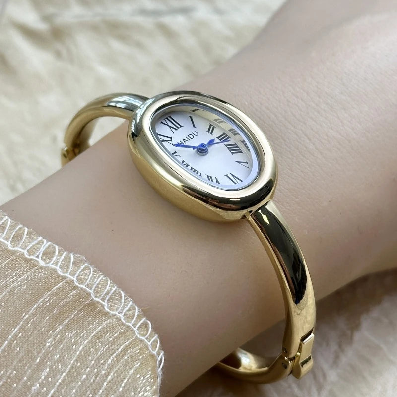 Gold Bangle Bracelet Watch for Women – Oval Dial, Roman Numerals