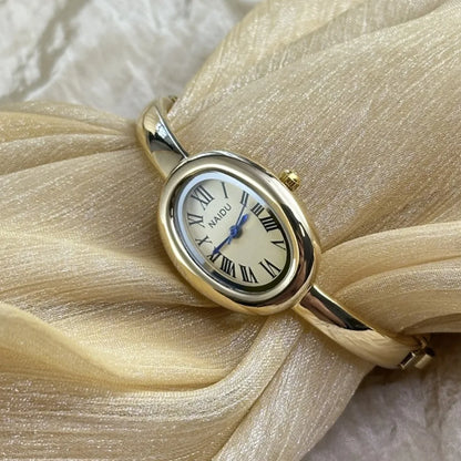 Gold Bangle Bracelet Watch for Women – Oval Dial, Roman Numerals