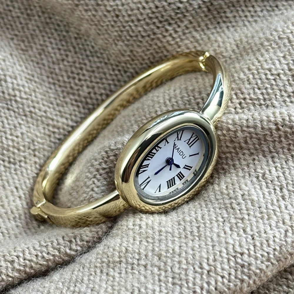 Gold Bangle Bracelet Watch for Women – Oval Dial, Roman Numerals