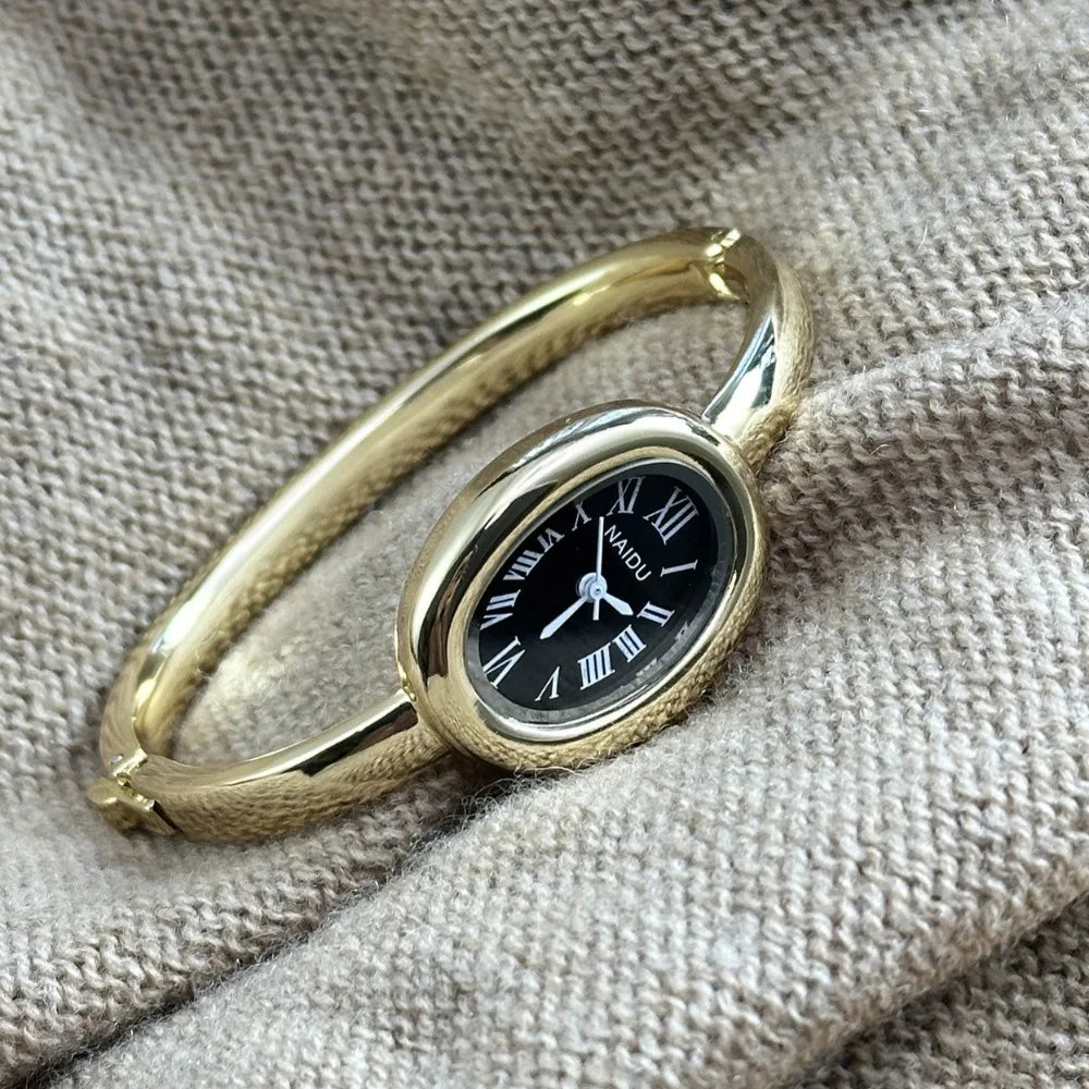 Gold Bangle Bracelet Watch for Women – Oval Dial, Roman Numerals